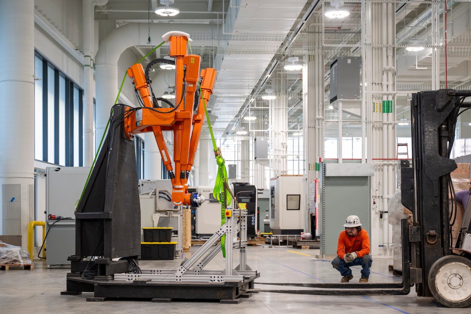 A large industrial robot CNC machine getting set up inside the Protoplex